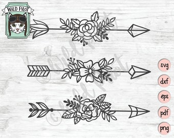 Pode incluir: Três desenhos de flechas florais em preto e branco com uma ponta de flecha geométrica. As flechas estão sobrepostas em um fundo de madeira.