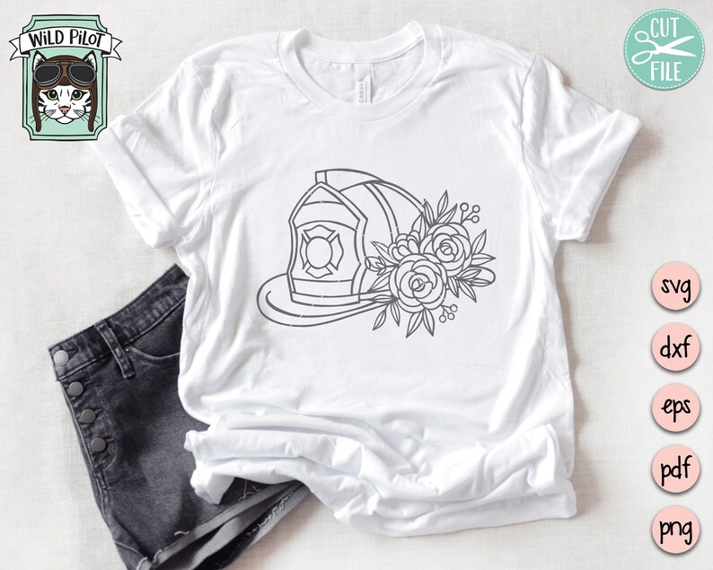 May include: A white t-shirt with a black line drawing of a firefighter's helmet with flowers on the side.