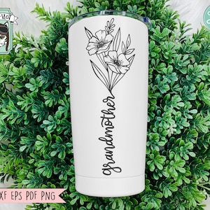 May include: White stainless steel tumbler with a black floral design and the word "grandmother" written vertically down the side.