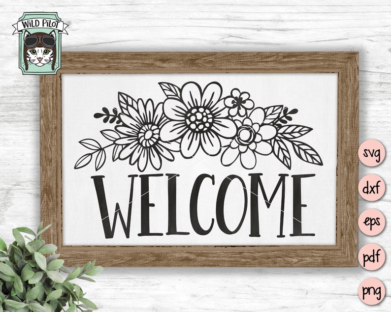 Peut inclure: Une pancarte de bienvenue en noir et blanc avec un motif floral. La pancarte est dans un cadre en bois et porte le mot "WELCOME" en grandes lettres audacieuses.