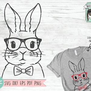 Könnte beinhalten: Eine Schwarzweiß-Zeichnung eines Kaninchens mit Brille und Fliege. Das Kaninchen schaut direkt auf den Betrachter. Das Bild ist auf weißem Hintergrund. Der Text "SVG DXF EPS PDF PNG" befindet sich unter dem Kaninchen.