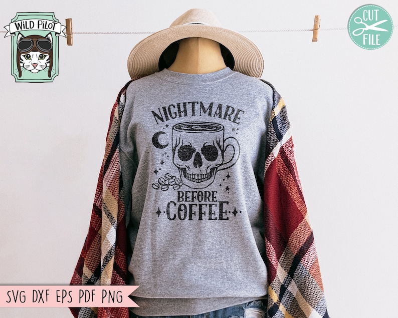 May include: Gray sweatshirt with a black skull and coffee cup graphic. The text reads "Nightmare Before Coffee".