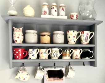 s55 Scandinavian design shelving made of solid pine with hooks