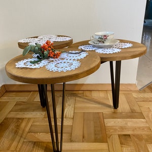 ZINA 2 Designed coffee table with three tops and hairpin legs