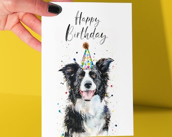 Peut inclure: Une carte d'anniversaire illustrant un border collie noir et blanc en aquarelle portant un chapeau de fête coloré. La carte a un fond blanc avec des éclaboussures de peinture colorées et le texte "Happy Birthday".