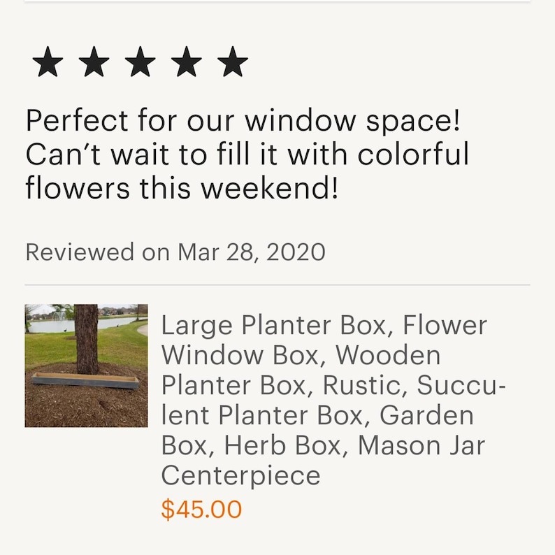 May include: A large wooden planter box, perfect for growing flowers or herbs. It is made of rustic wood and has a natural finish. The planter box is 45 inches long and 12 inches wide. It is shown in a window setting.