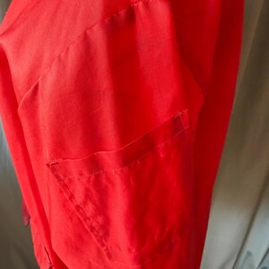 May include: A set of three ceramic mugs with a speckled, matte finish in cream, light grey, and dark grey. Each mug has a simple, minimalist design and a rounded handle.