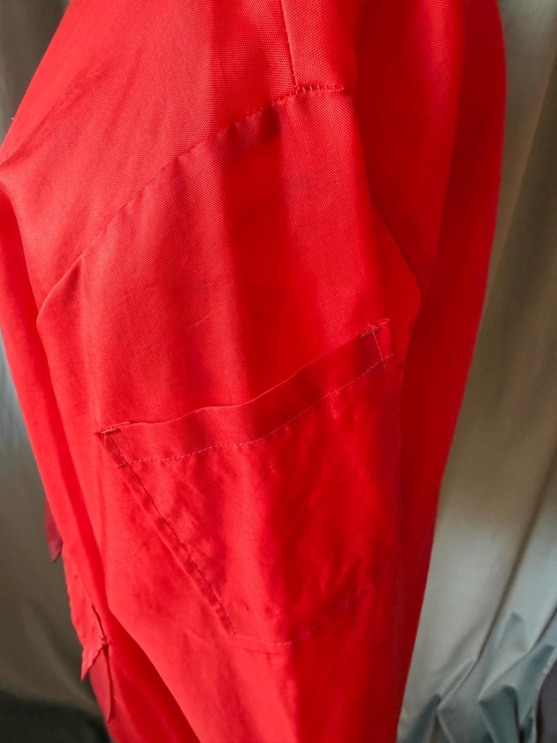 May include: A set of three ceramic mugs with a speckled, matte finish in cream, light grey, and dark grey. Each mug has a simple, minimalist design and a rounded handle.