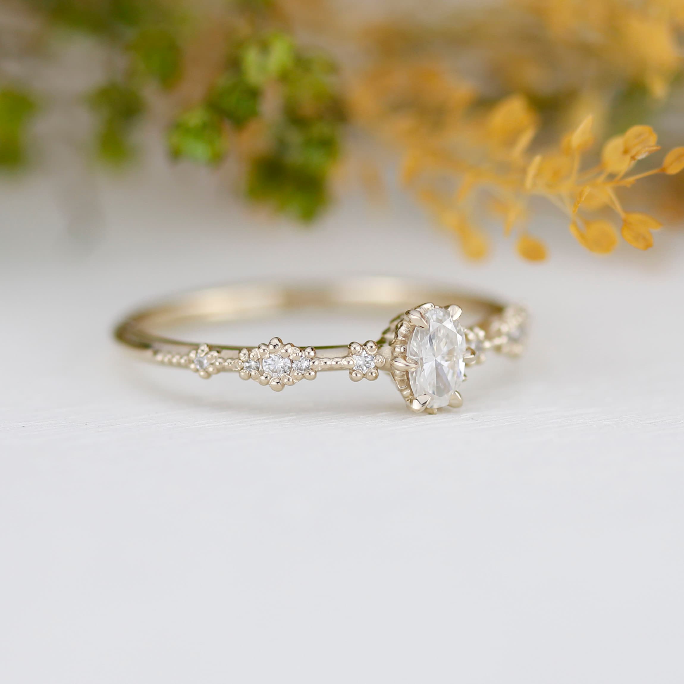 Gold oval sales wedding ring