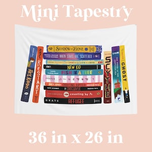 May include: White mini tapestry featuring a stack of colorful book spines. The tapestry reads "Mini Tapestry" at the top and "36 in x 26 in" at the bottom. The book titles include "Shadow and Bone" and "Hey, Kiddo".