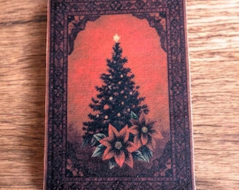 May include: A rectangular Christmas-themed image featuring a dark green Christmas tree with a star on top, set against a red background. Two poinsettias are at the base of the tree. The image is framed by a decorative border.