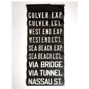 May include: Black and white sign with the text "CULVER EXP.", "CULVER L'C'L", "WEST END EXP", "WESTEND L'C'L.", "SEA BEACH EXP.", "SEA BEACH L'C'L.", "VIA BRIDGE", "VIA TUNNEL", and "NASSAU ST."