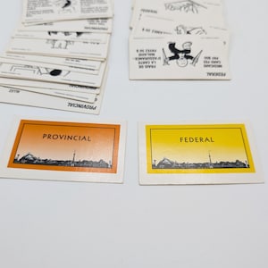 Carte sostitutive Monopoly Canadian Edition 2000 16 Federale (probabilità) 14 Provinciale (cassa della comunità)