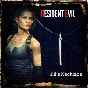 May include: A silver necklace with a long, thin pendant. The necklace is worn by a woman with short, dark hair. The text "RESIDENT EVIL" and "Jill's Necklace" is visible in the image.