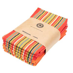 May include: A stack of six red, orange, yellow, green, and blue striped kitchen towels with a brown paper label that reads "100% Cotton Kitchen Towels".
