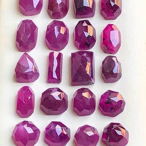 Natural Ruby (corundum) rosecuts,flat back ,70 carats , 7.5 to 10.5  mm