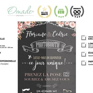 May include: A black and white chalkboard style photo booth sign with pink floral accents. The sign reads "Floriane & Cedric Photobooth Laissez-nous un souvenir de ce jour unique! Prenez la pose Souriez & Amusez-vous Des accessoires sont".