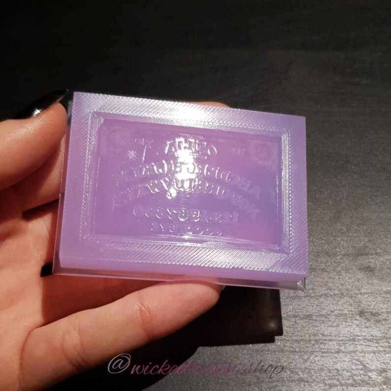 Glossy ouija board mold with matte details
