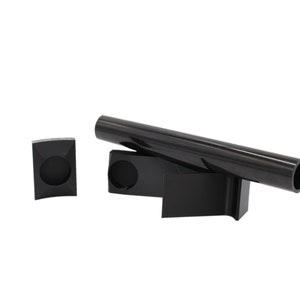 May include: A set of three black plastic pipe holders. The holders are designed to hold a pipe in place. The holders are made of a durable plastic and are easy to install.
