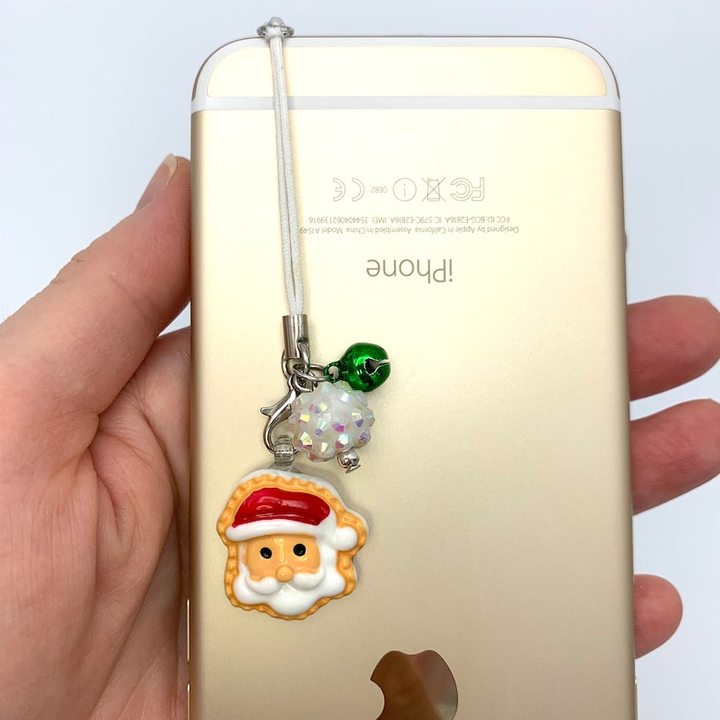 Switch charm phone charm Santa Claus dust plug charm has an AB rhinestone bead and a green bell