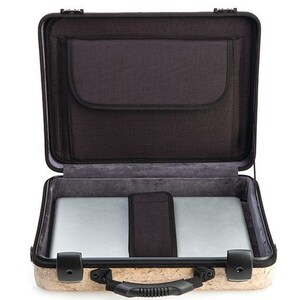 May include: A brown and black laptop case with a cork exterior. The case is open and has a black interior with a padded laptop compartment and a smaller pocket.