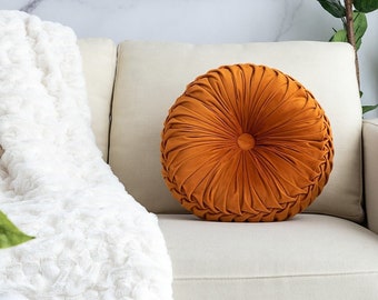 round orange pillow