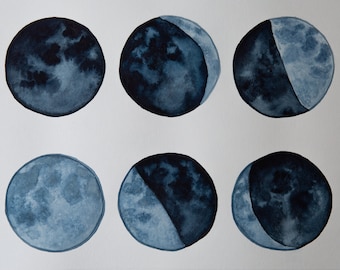 May include: Six watercolor paintings of the moon in different phases. The moon is painted in shades of blue and gray.