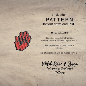May include: A digital pattern for beading a red hand with black details. The pattern is for brick stitch or peyote stitch and is available for instant download as a PDF. The pattern is by Wild Rose & Sage Indigenous Beadwork Patterns.