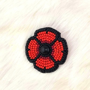 Ruby red beaded Poppy brooch pin for remembrance day veterans day with charlotte beads that sparkle catch light poppy gift flower