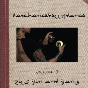 May include: A book cover with a brown background and a picture of a person playing cymbals. The title of the book is "fatchancebellydance" and the text below the picture is "3 years" and "قصر غرين and زيكس"
