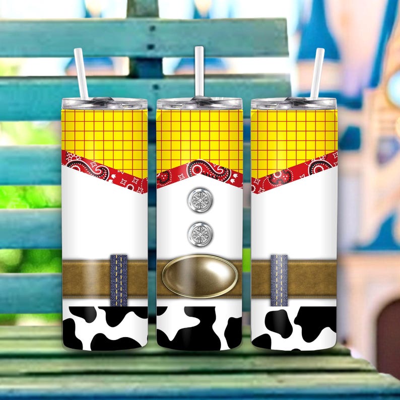May include: Three stainless steel tumblers with white straws. The tumblers are decorated with a design that resembles a cowboy's outfit. The top is yellow with a red bandana pattern, the middle is white with silver buttons, and the bottom has a black and white cow pattern.