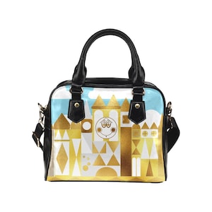 Small World Faux Leather Crossbody Dome Bag | disneybounding disney disneyland small world bound parks shoulder tote bag purse