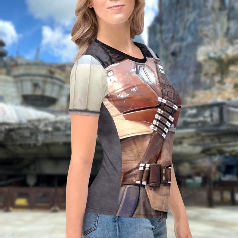 A woman wearing a t-shirt with a printed design of a character from a television series or movie.