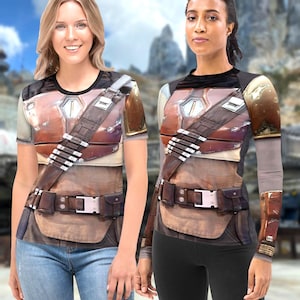 Two women wearing t-shirts with a futuristic, space-themed design.