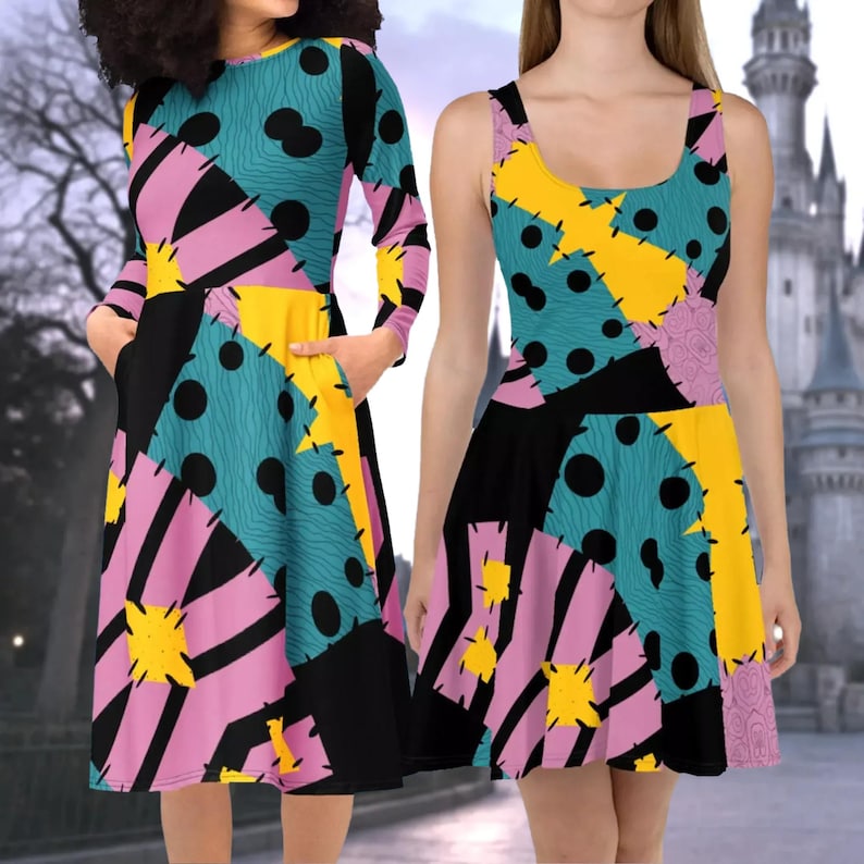 a woman standing next to another woman in a dress