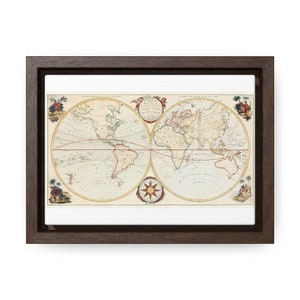 May include: A vintage world map print in a brown frame. The map is divided into two hemispheres, with the Americas on the left and Europe, Asia, and Africa on the right. The map is decorated with ornate borders and compass roses.