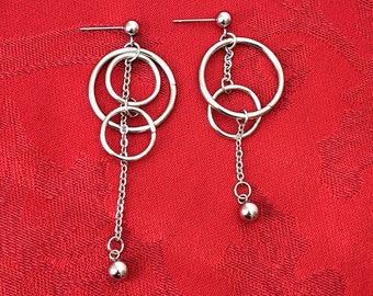 Large circle earrings, irregular statement earrings, fashionable modern earrings, trendy pretty earrings, cool mismatched earrings, style
