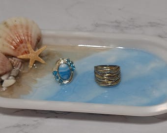 Soporte ovalado hawaiano para joyas con diseño de playa costera, en resina.