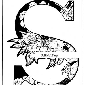 May include: Black and white floral design of the letter "S". The letter is filled with a black and white floral pattern and a large flower in the center. The text "Dotti'sLilShop" is at the bottom.