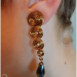 Viking drop handcrafted silver spirals earrings, custom Celtic swirl earrings