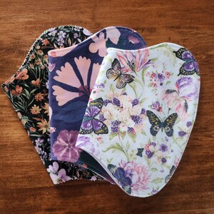 baybeelove burpie set: flowers and butterflies. sweet floral nursery. flowers, butterflies.