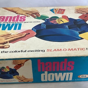 MÃOS PARA BAIXO O jogo mais slapappier de todos os tempos… Apresentando o colorido e emocionante Slam-O-Matic! Jogo de cartas combinando Fast Action 1964 da Ideal Toy Corp