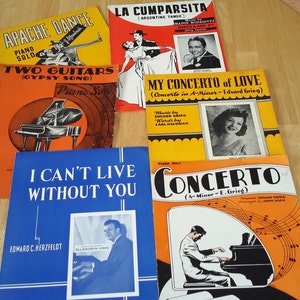 May include: A collection of vintage sheet music featuring piano solos. The titles include "Apache Dance", "Two Guitars (Gypsy Song)", "La Cumparsita", "My Concerto of Love", "I Can't Live Without You", and "Concerto (A-Minor - E. Grieg)".