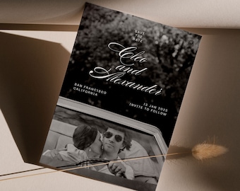 May include: Save the date card with a black and white photo of a couple in a car. The text reads "Save the Date Cleo and Alexander San Francisco, California 13 Jan 2025 Invite to follow"