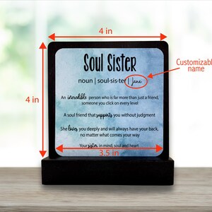 May include: A black wooden block with a 10 cm by 10 cm sign that reads "Soul Sister" with a definition and customizable name. The sign is 9 cm wide and has a watercolor background.
