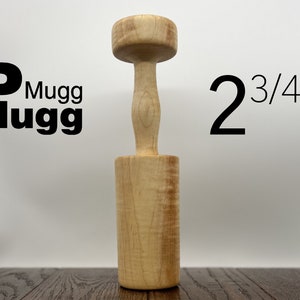 Peut inclure: Un maillet en bois avec un manche de 7 cm. Le maillet est en bois clair avec un motif de grain naturel.