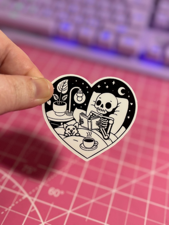 Reading Skeleton and Dog Sticker , Skeleton Sticker , Dog Sticker , Bookish Sticker , Cozy Reading Sticker , Book Sticker , Spooky Sticker