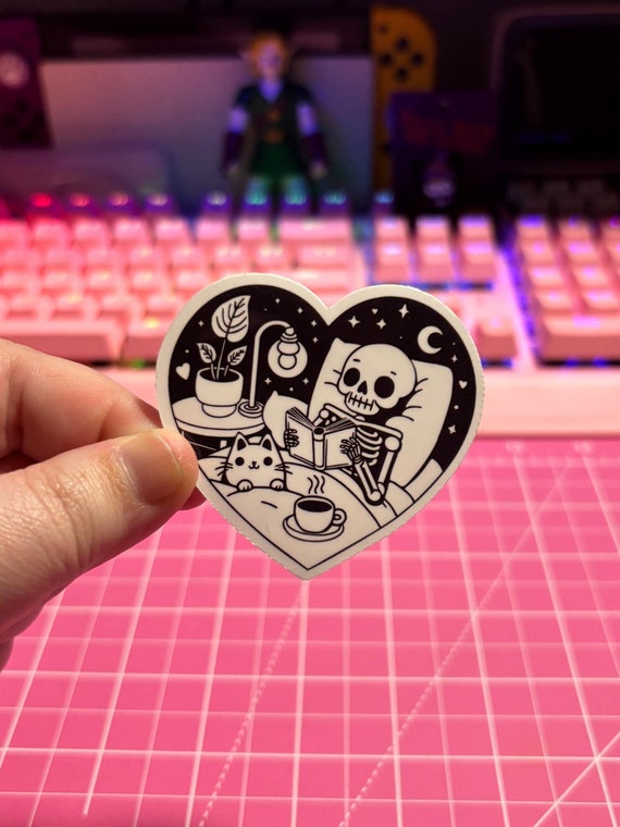 Reading Skeleton and Cat Sticker , Skeleton Sticker , Cat Sticker , Bookish Sticker , Cozy Reading Sticker , Book Sticker , Spooky Sticker