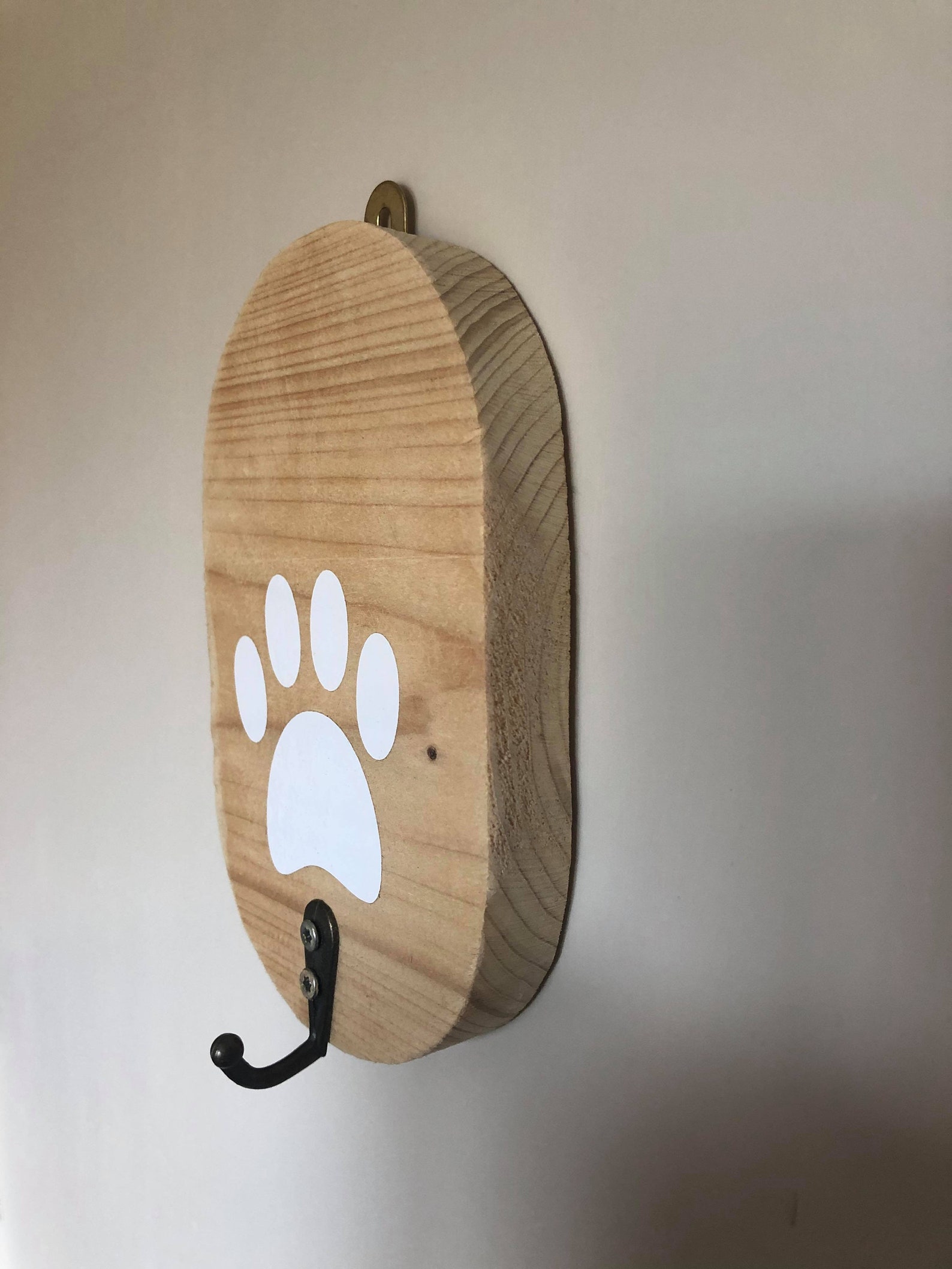 Wooden dog lead holder with paw print sticker. Homemade Etsy