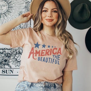 America The Beautiful Flag Tee Patriotic T Shirt 4th of July Tee Women's Tee USA Freedom America Stars and Stripes Heather Peach